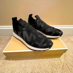Michael Kors slip on tennis shoes. New
